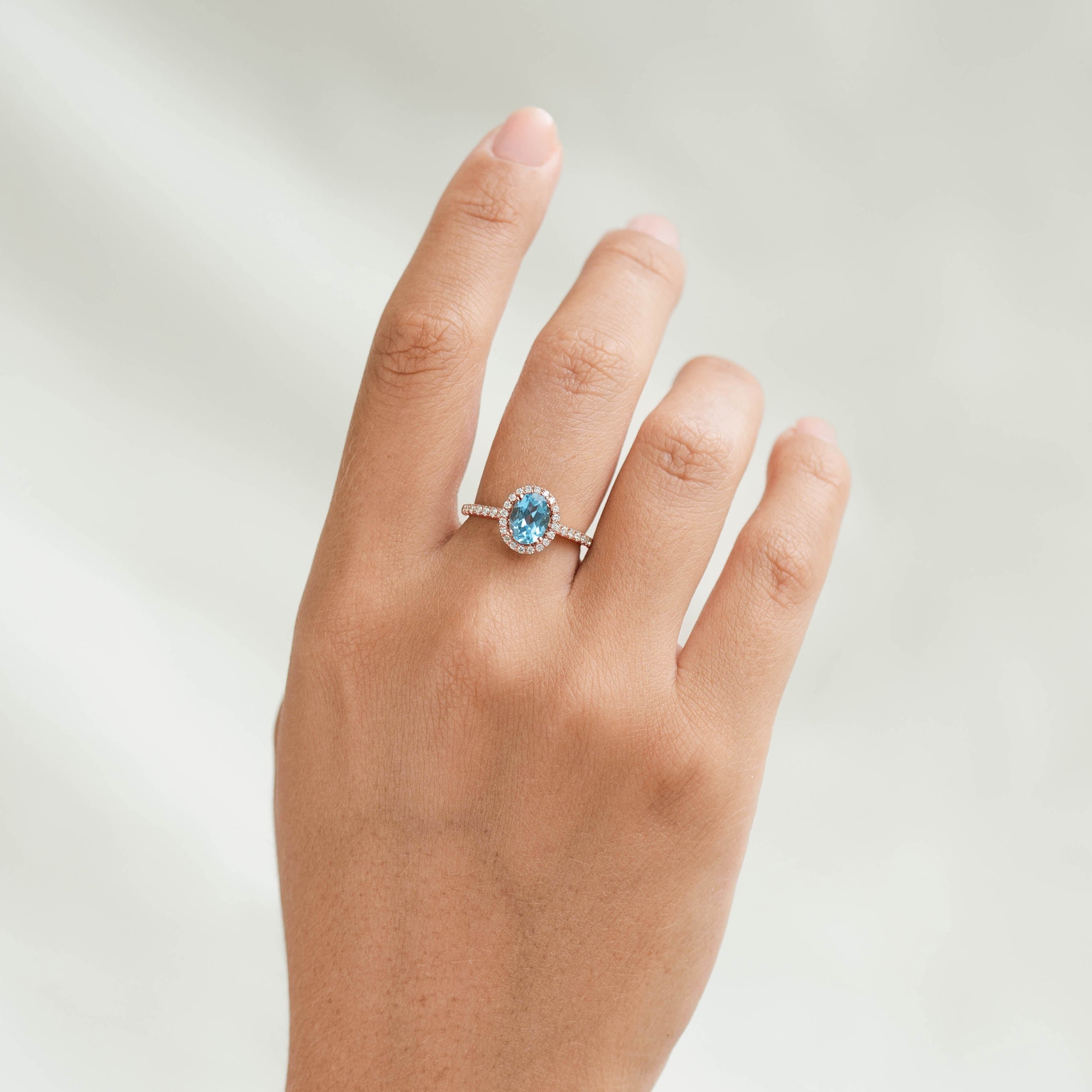 14K Rose Gold Oval Blue Topaz Halo Ring