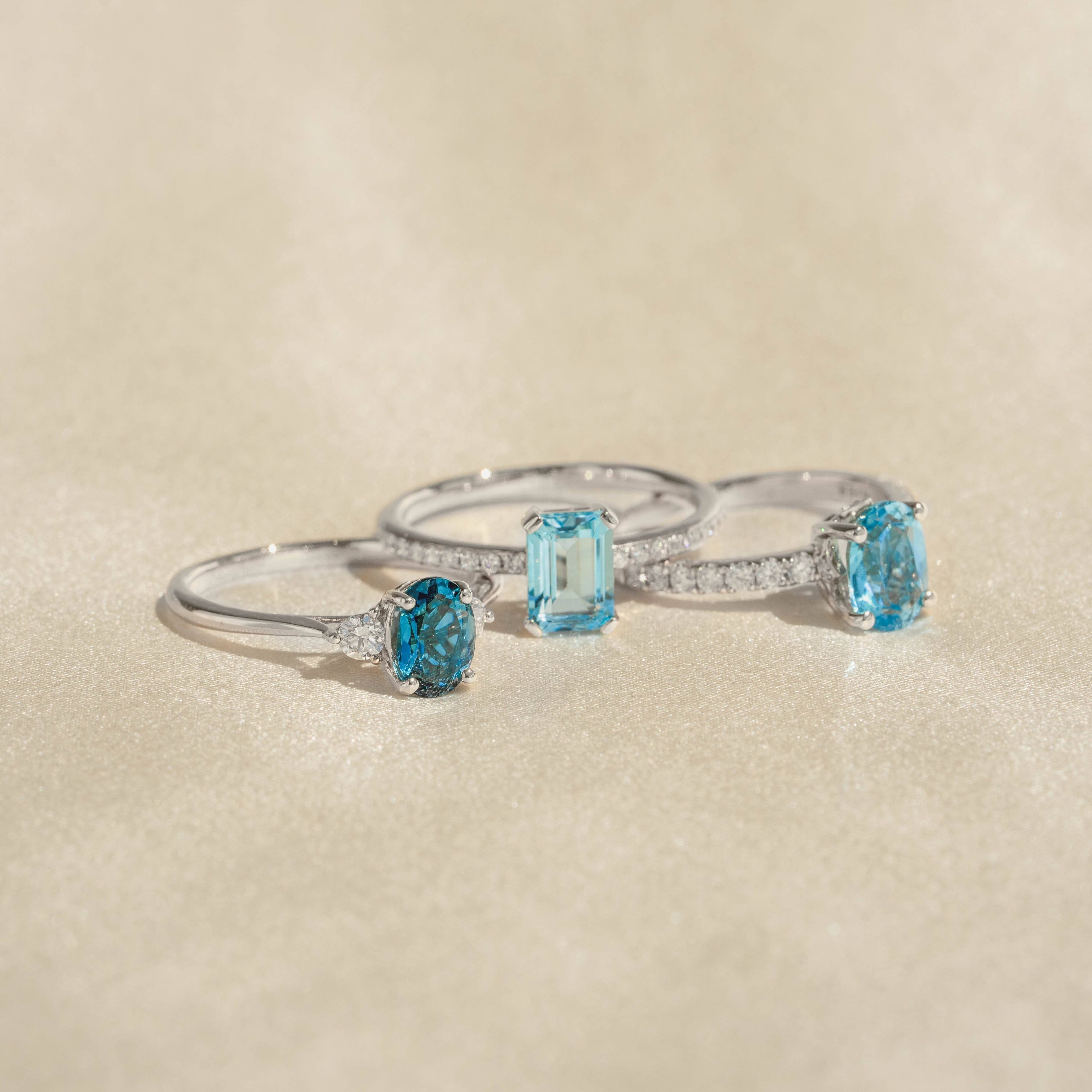 14K White Gold Oval Blue Topaz and Diamond Ring
