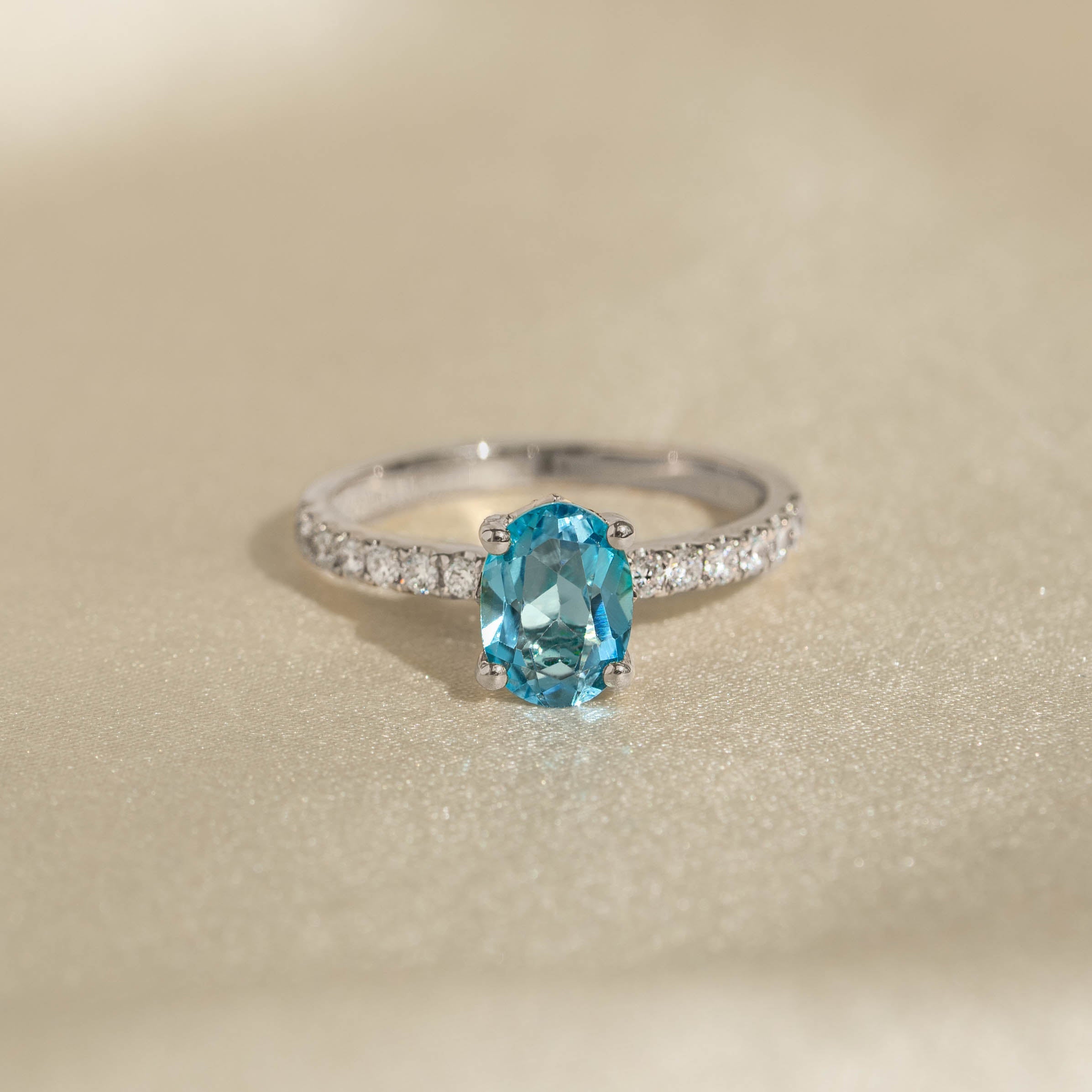 14K White Gold Oval Blue Topaz and Diamond Ring