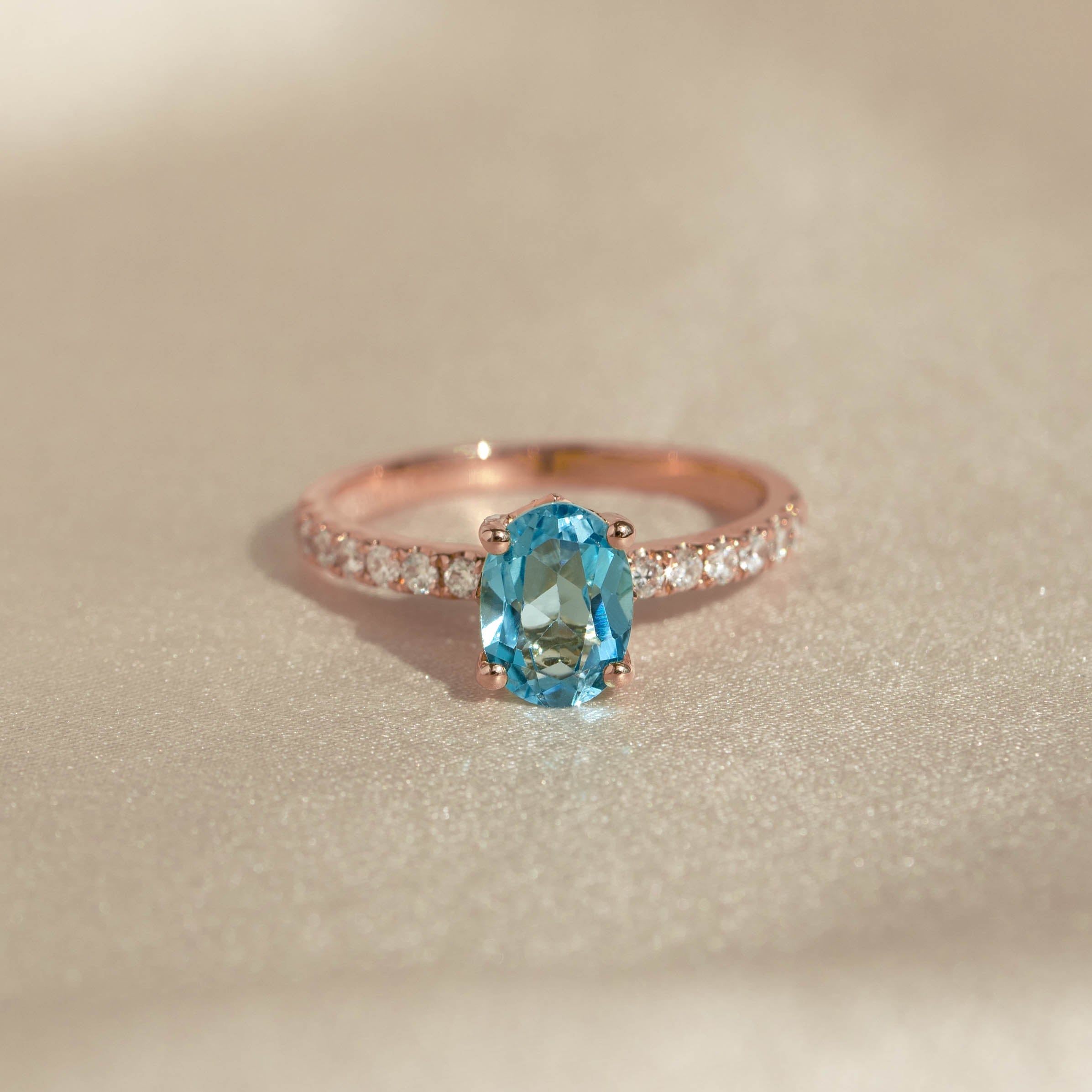 14K Rose Gold Oval Blue Topaz and Diamond Ring