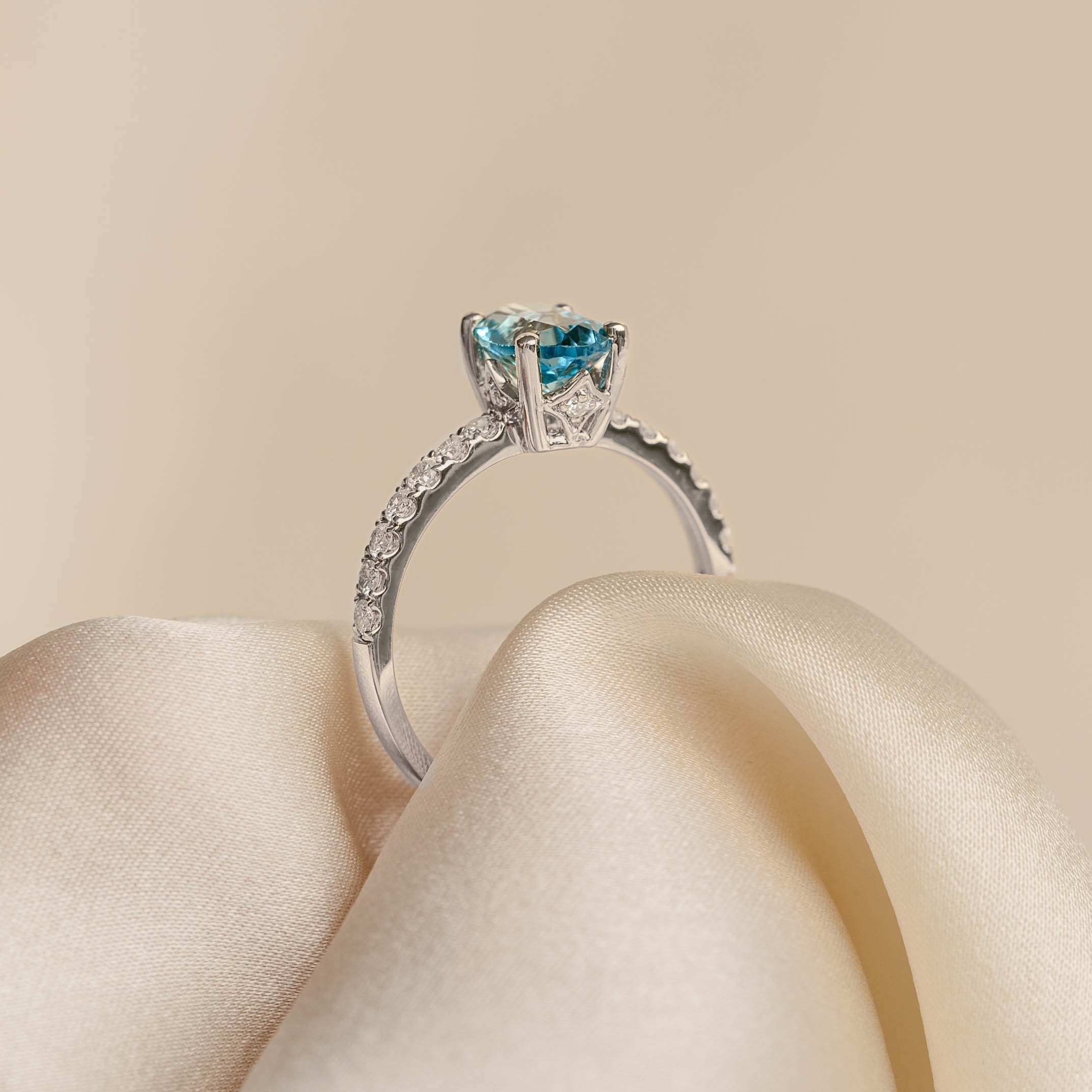 14K White Gold Oval Blue Topaz and Diamond Ring