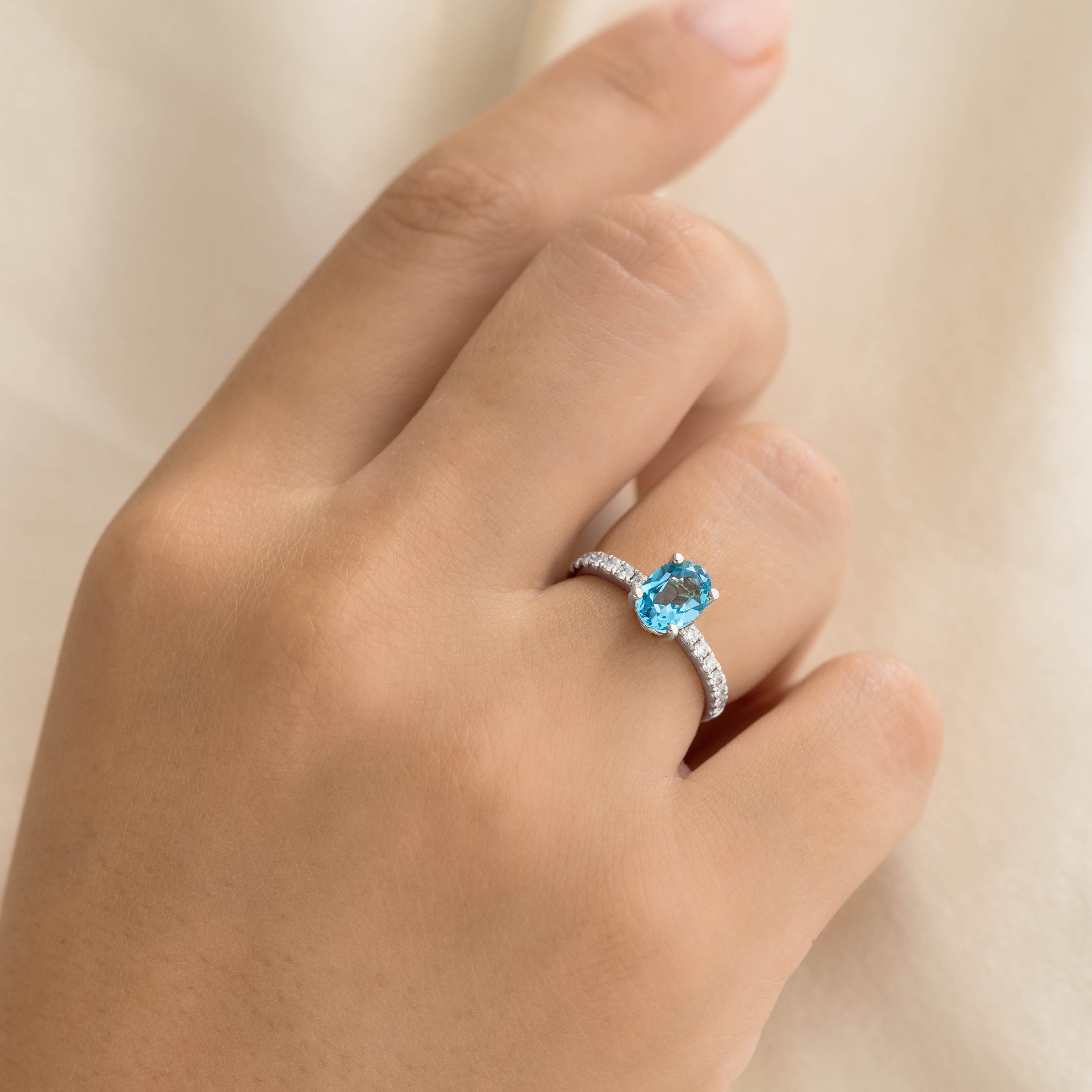 14K White Gold Oval Blue Topaz and Diamond Ring