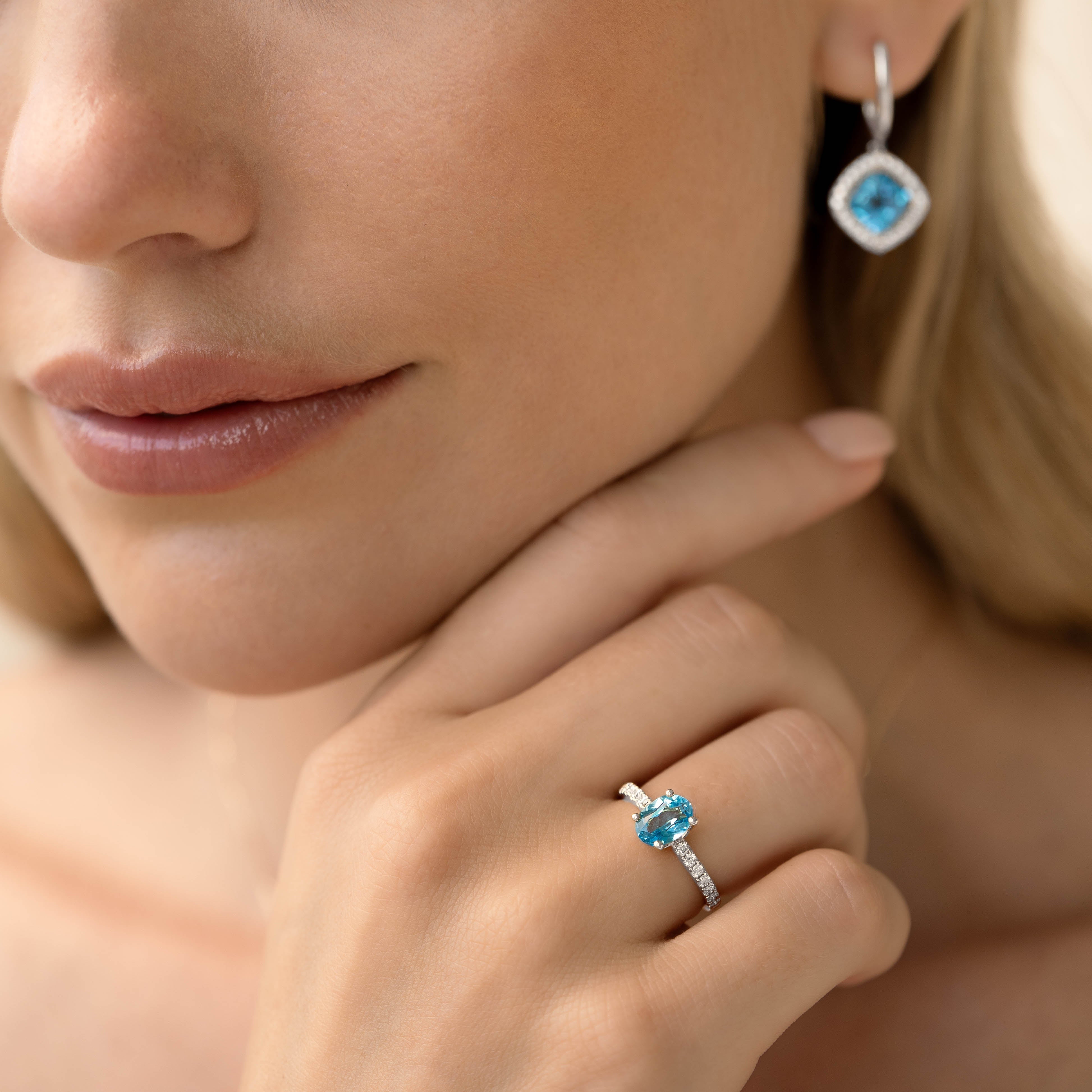14K White Gold Oval Blue Topaz and Diamond Ring