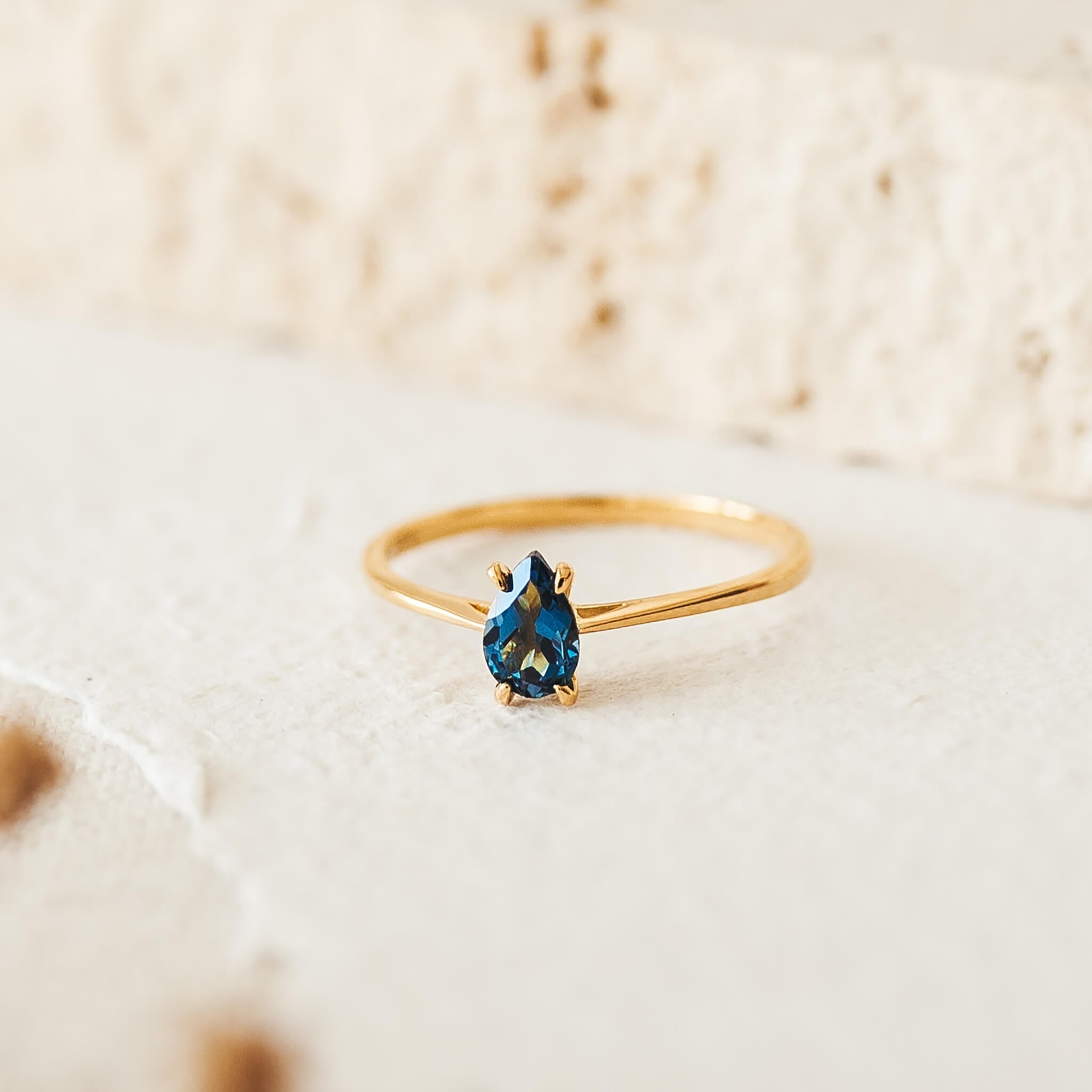 14K Gold Pear-Shaped Blue Topaz Solitaire Ring