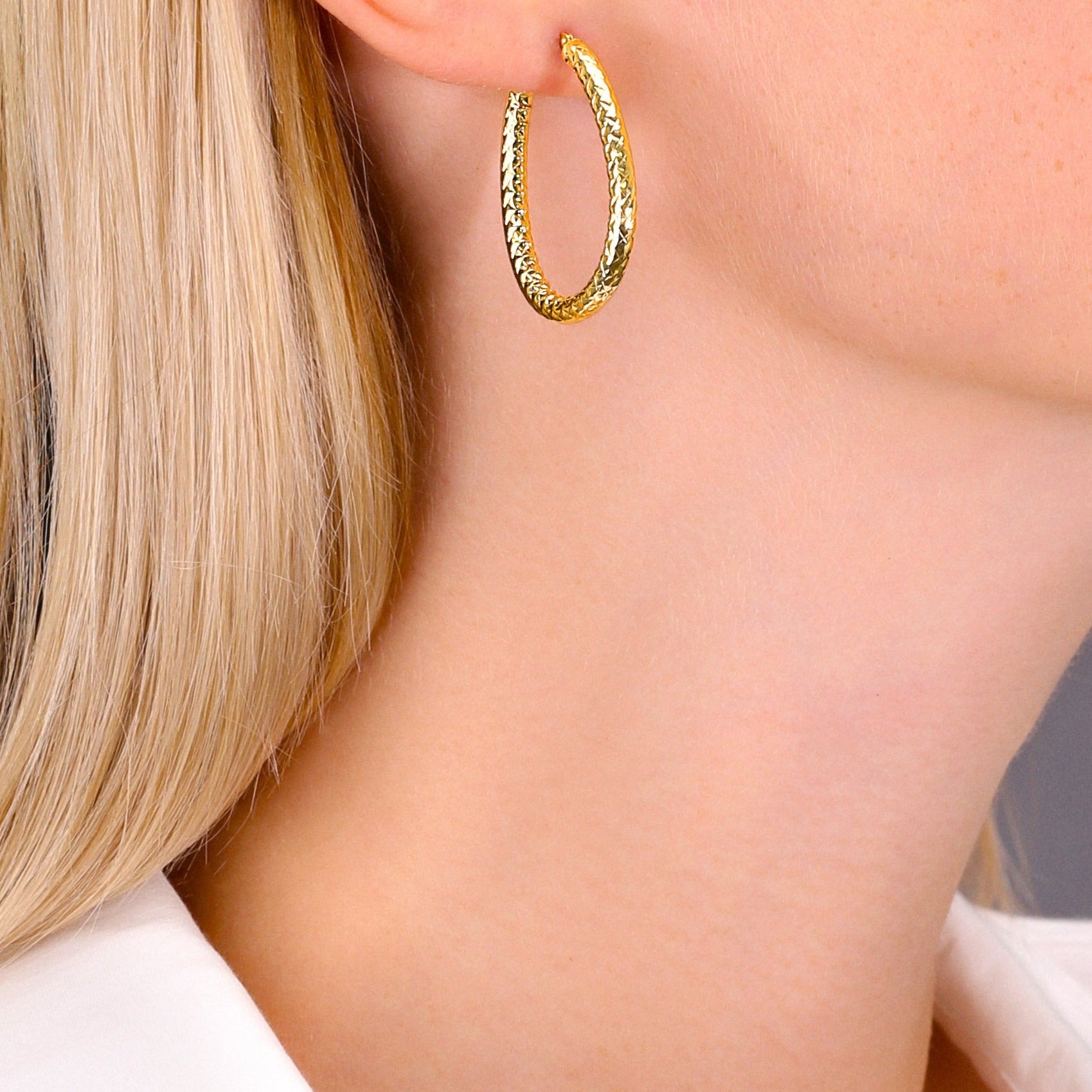 14k Yellow Gold Textured Hoop Earrings. The Alligator Collection