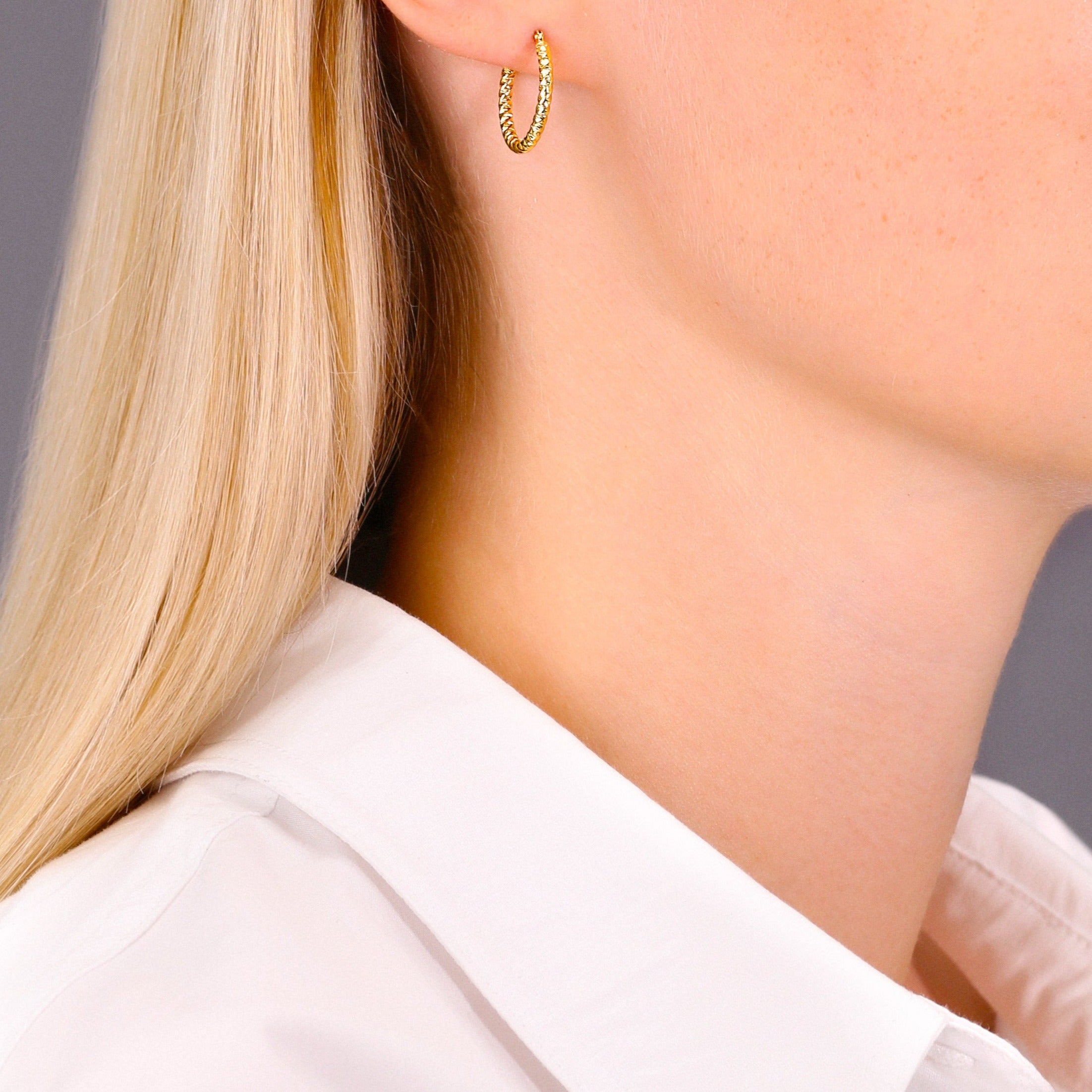 14k Yellow Gold Textured Hoop Earrings. The Twist Collection