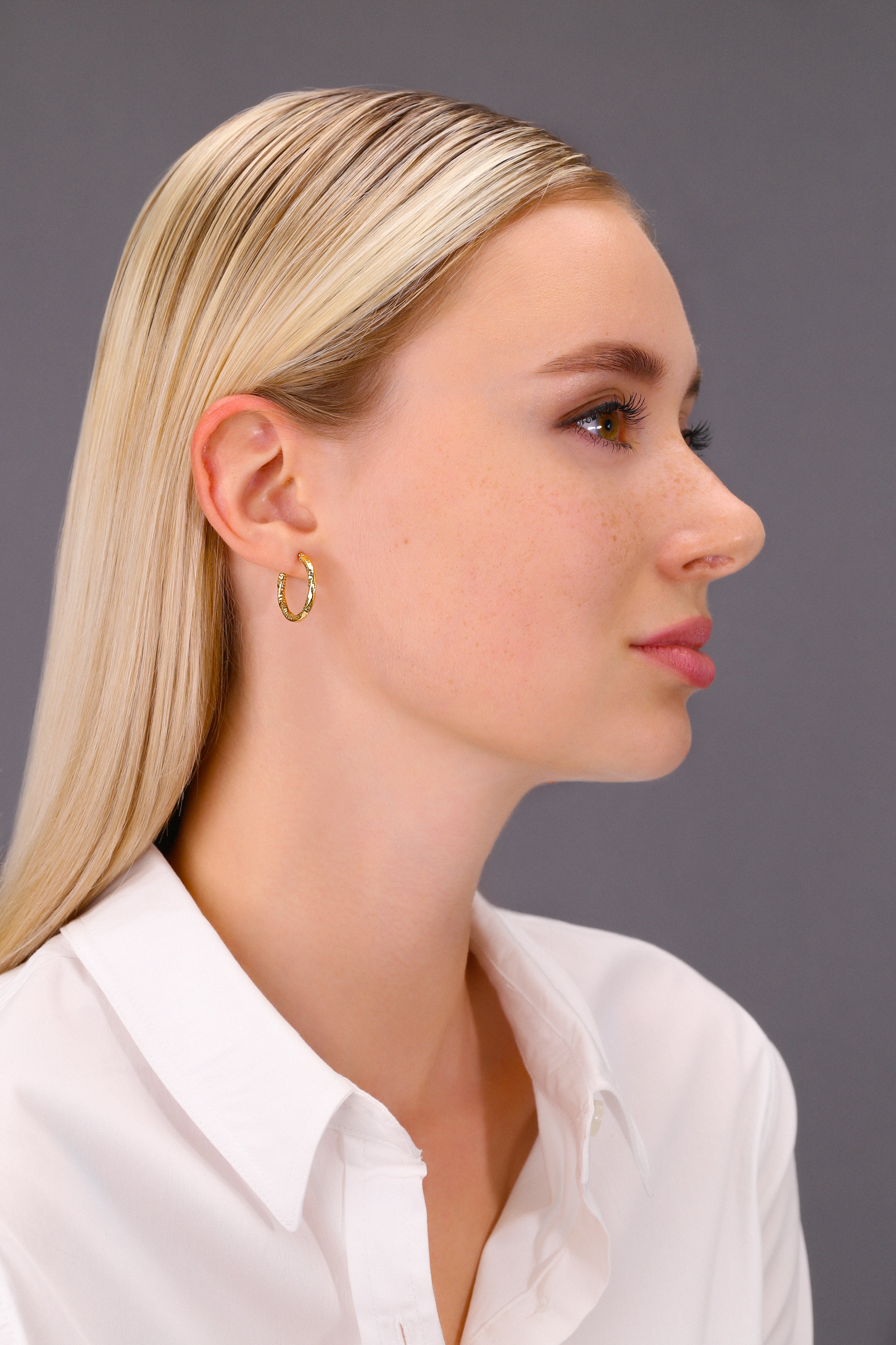 14k Yellow Gold Textured Hoop Earrings. The Spiral Collection