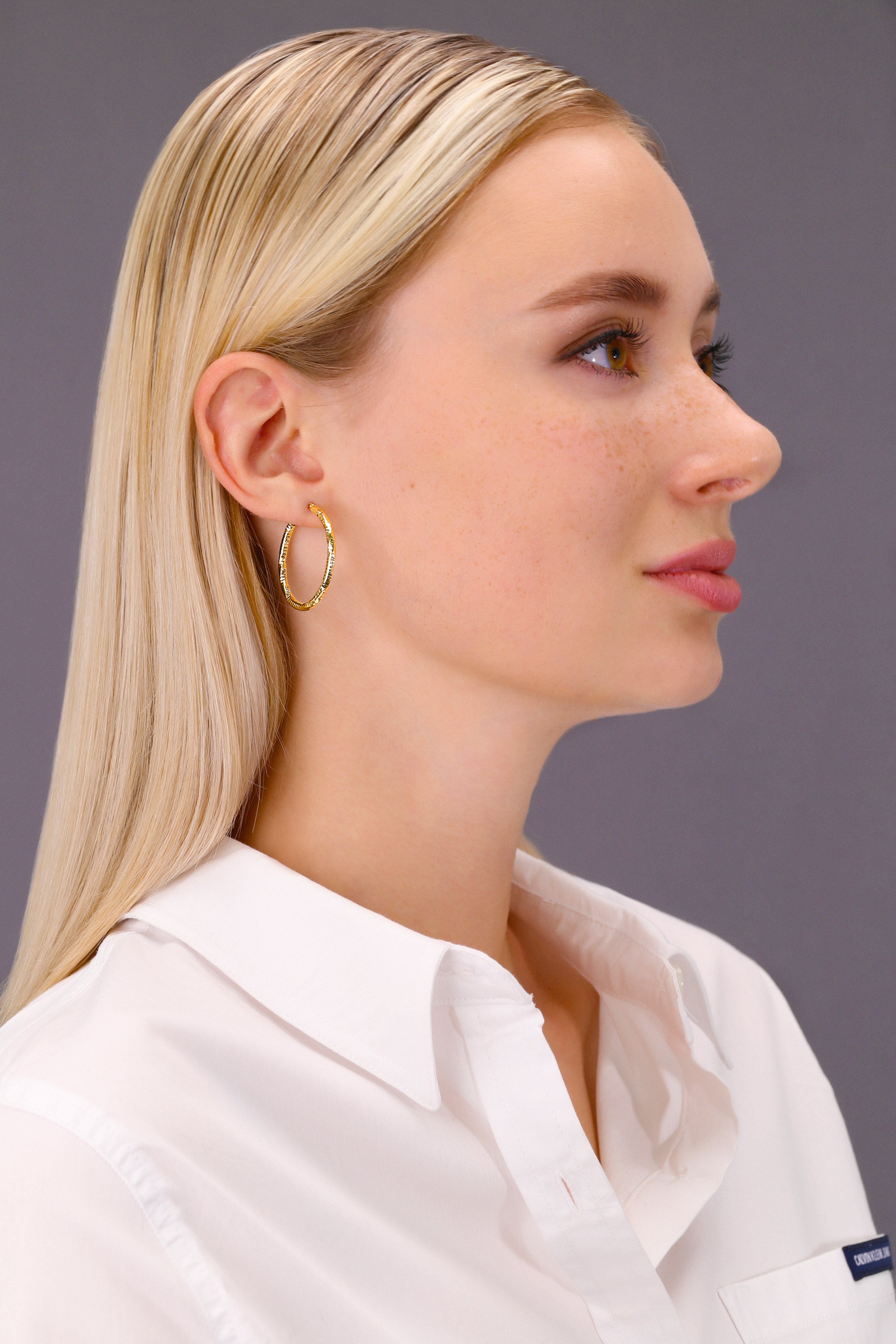 14k Yellow Gold Textured Hoop Earrings. The Spiral Collection